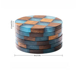 A stack of round wooden coasters with a blue and brown checkerboard pattern, shown with dimension lines indicating a height of 0.7cm (0.