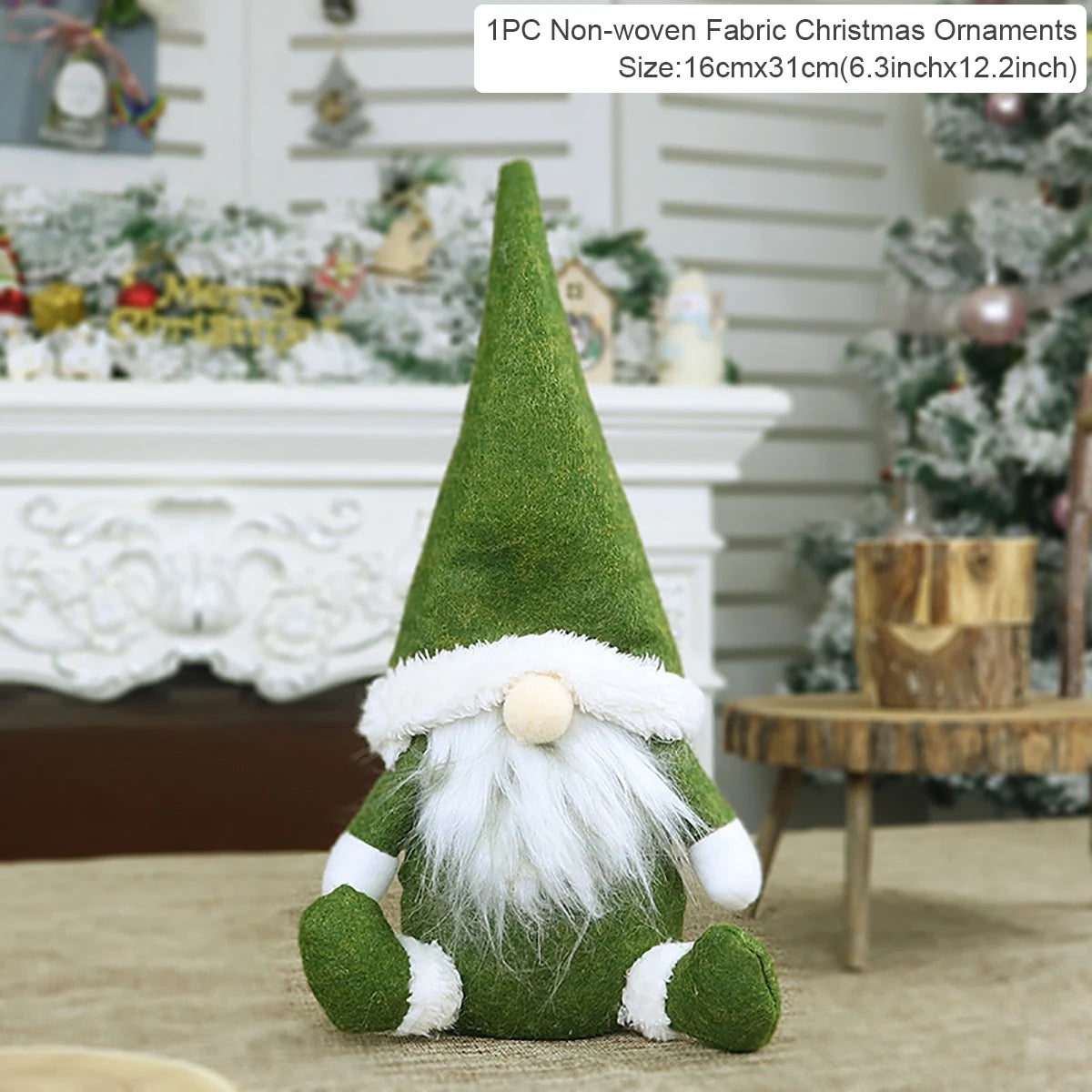Green fabric Christmas gnome with a pointed hat and white beard sits before a decorated fireplace beside a 16 × 31 cm label.