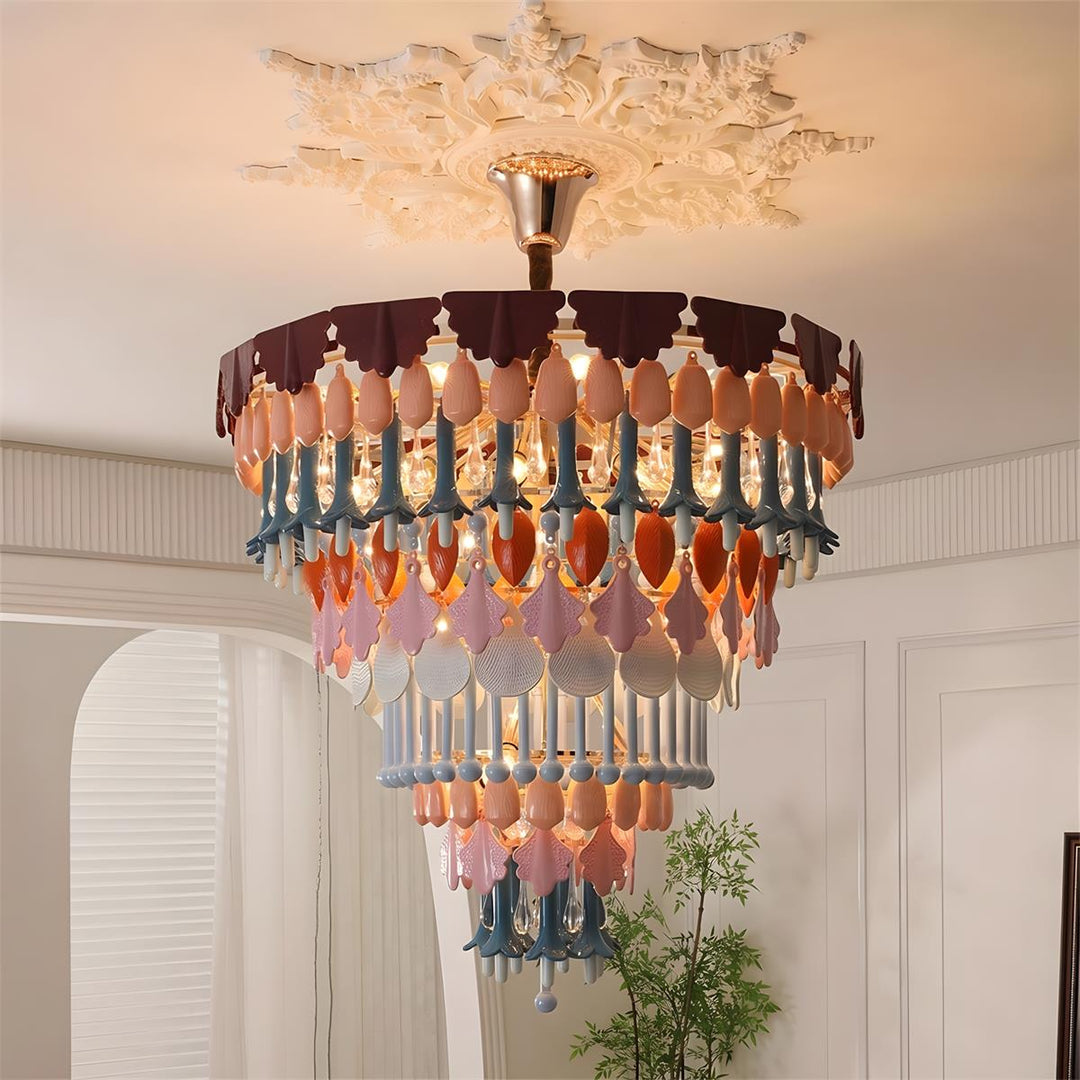 Decorative chandelier hanging in a room with a neutral color scheme.
