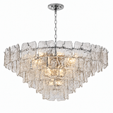 Illuminated chandelier with tiered clear textured glass panels and a silver chain against a white background.