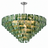 Illuminated chandelier with tiered dark green textured glass panels and a silver chain against a white background.