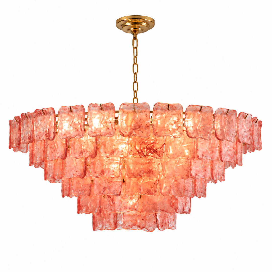 Illuminated chandelier with tiered pink textured glass panels and a gold chain and ceiling canopy against a white background.