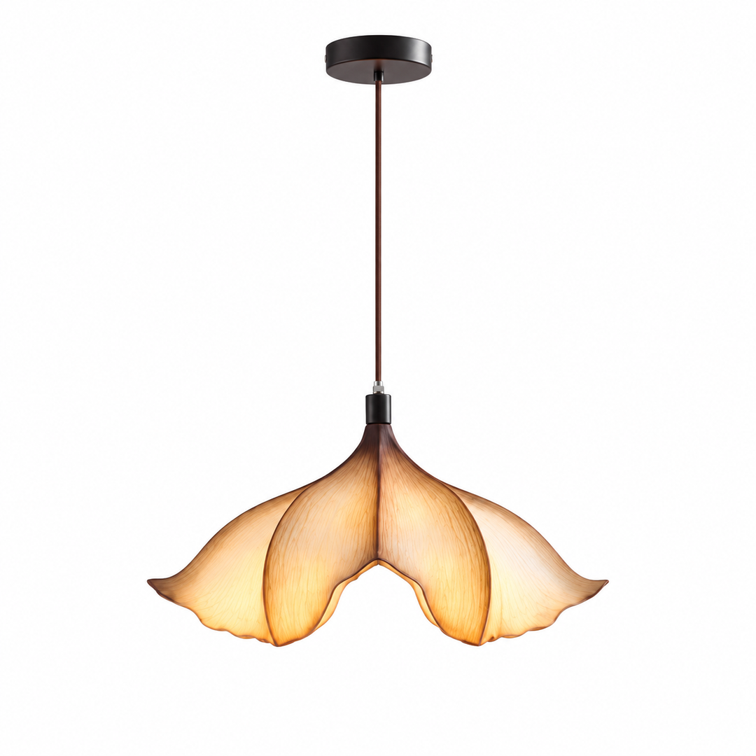 A modern pendant light with a dark metal canopy and rod, featuring a warm amber-tinted glass shade with a petal-like flared design, shown against a plain white background.