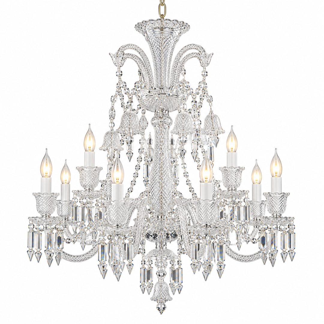 A multi-tiered crystal chandelier with a silver-tone metal frame, adorned with clear faceted glass drops and candle-style bulbs, shown against a plain white background.