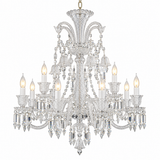 A multi-tiered crystal chandelier with a silver-tone metal frame, adorned with clear faceted glass drops and candle-style bulbs, shown against a plain white background.