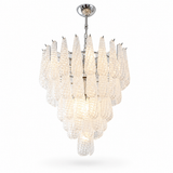 A modern multi-tier chandelier with textured, teardrop-shaped clear glass shades and a polished silver/chrome metal frame and canopy, shown against a plain white background.