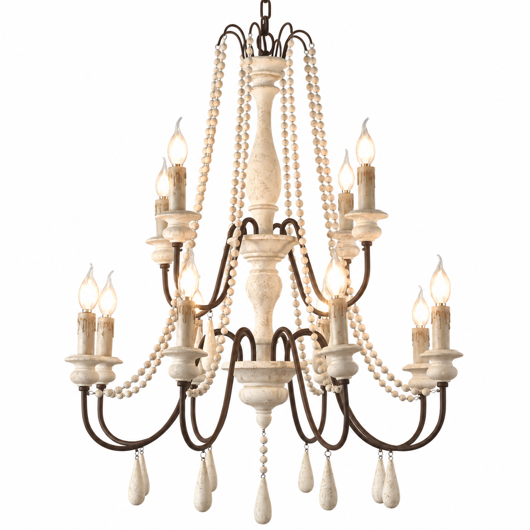 A multi-tiered chandelier with a distressed dark metal frame, cream-colored carved accents, hanging bead strands, and candle-style bulbs, shown against a plain white background.