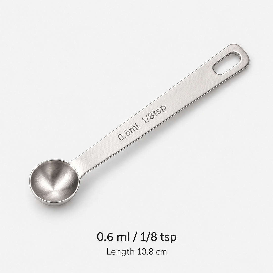 Stainless-steel 0.6 ml / 1/8 tsp measuring spoon, 10.8 cm long.