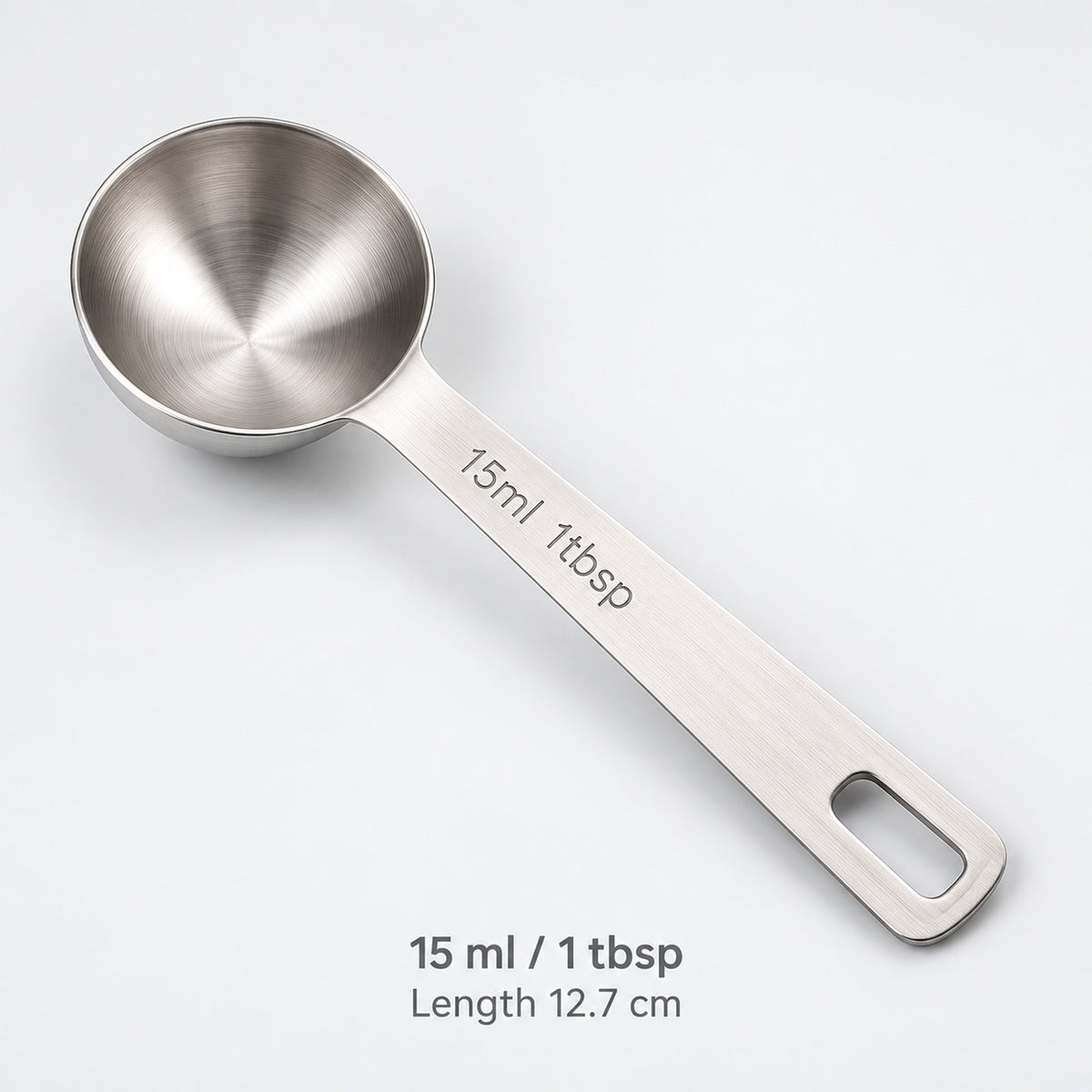 Stainless-steel 15 ml / 1 tbsp measuring spoon, 12.7 cm long.