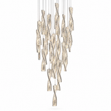 A modern multi-light chandelier with textured, twisted glass pendants in a cascading arrangement, suspended by thin cables against a plain white background.