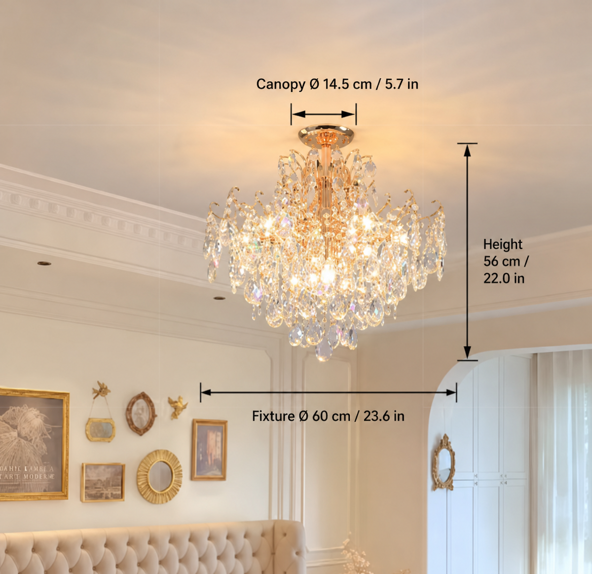A crystal chandelier hanging in a decorated room, with overlaid dimension arrows and text showing canopy diameter 14.5 cm, fixture diameter 60 cm, and height 56 cm.
