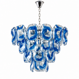 A modern multi-light chandelier featuring blue and clear glass swirls suspended from a polished silver metal chain and canopy, shown against a plain white background.