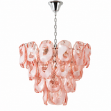 A modern multi-light chandelier featuring wavy, organic-shaped blush pink glass shades suspended from a polished silver-toned metal chain and canopy, shown against a solid white background.