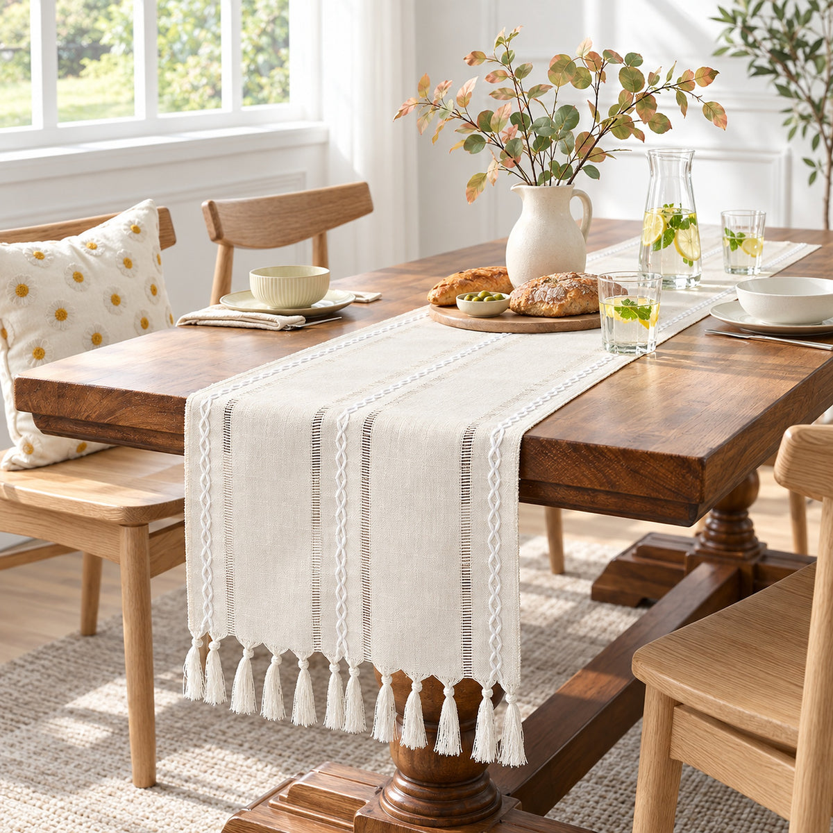Ivory cotton-linen runner dressing a dining table; tableware not included.