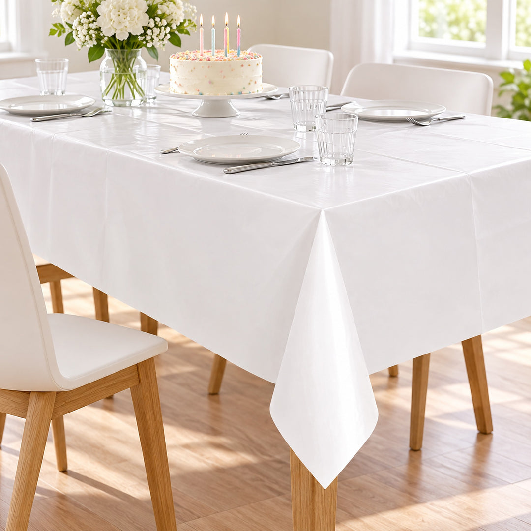 White disposable cover on a party dining table.