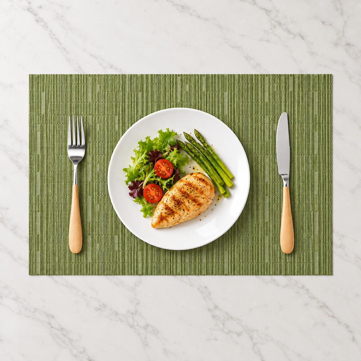 Olive-green woven vinyl placemat beneath an everyday place setting.