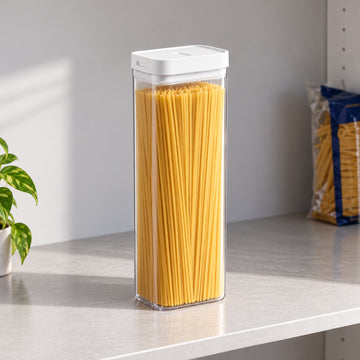 Tall clear pasta container keeping dry spaghetti visible and organized.