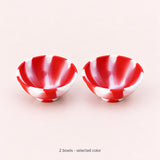Two red-and-white silicone mini bowls; selected color set.