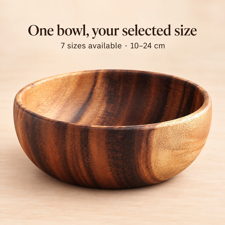 One handmade acacia bowl in your selected size; seven sizes from 10 to 24 cm.