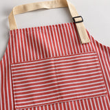 Red striped apron fabric, divided front pocket and adjustable beige neck strap.
