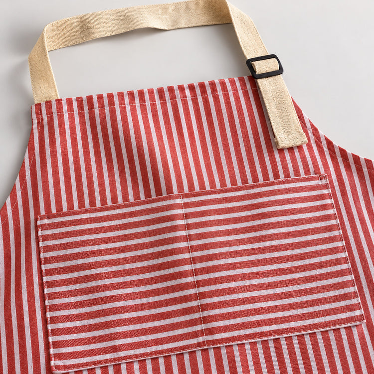 Red striped apron fabric, divided front pocket and adjustable beige neck strap.