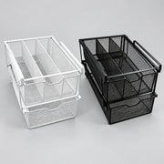 Two metal mesh drawer organizers shown on a light gray studio background, one in white and one in black.