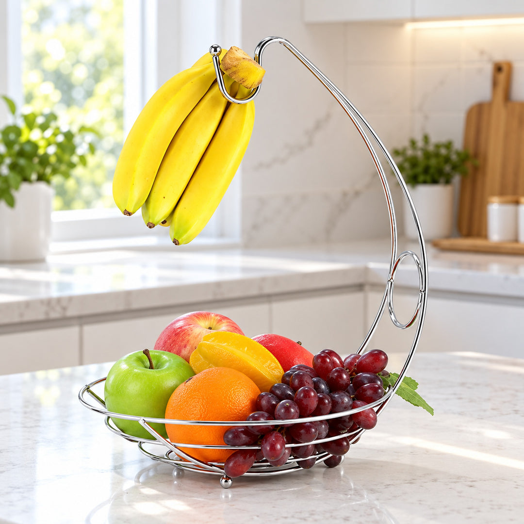 Chrome fruit basket organizes apples, oranges and grapes while bananas hang from the upper hook.