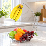 Chrome fruit basket organizes apples, oranges and grapes while bananas hang from the upper hook.