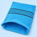 Blue exfoliating mitt with its open hand pocket and reinforced stitched edge visible.