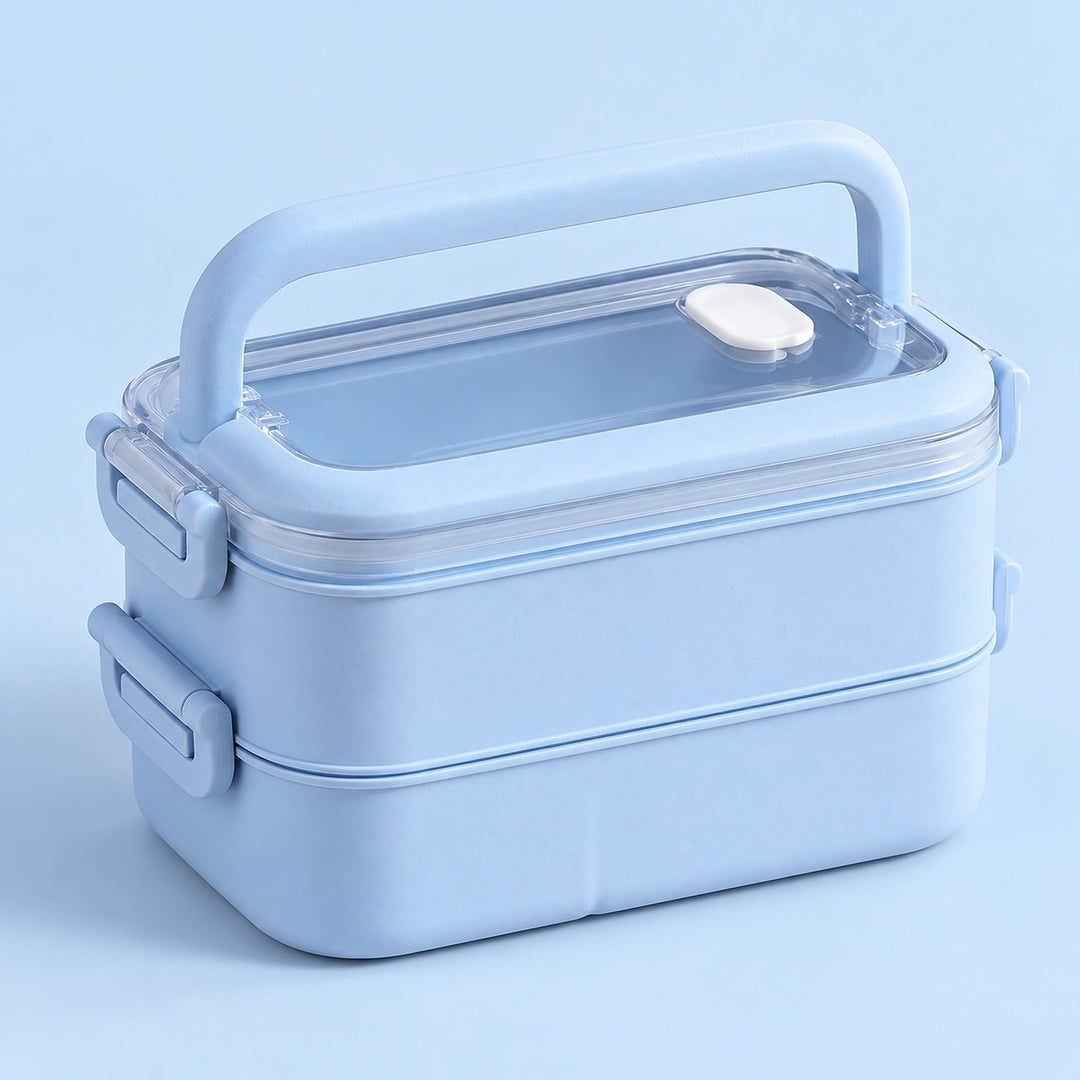Blue two-layer lunchbox showing carry handle, vented clear lid and side clips.