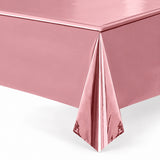 Reflective rose-gold plastic cover fold detail.