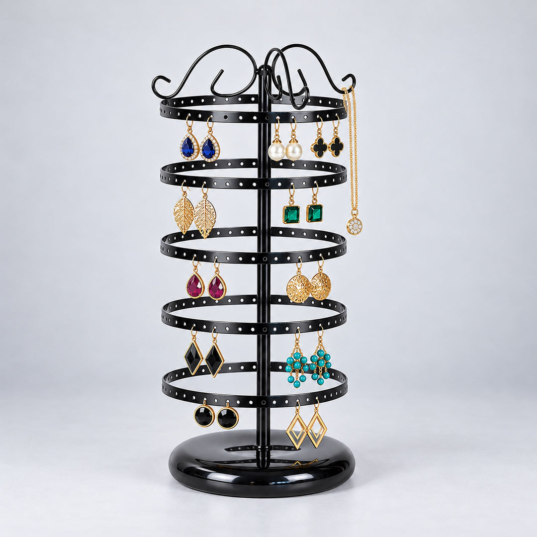 Five-tier black stand with earrings and a necklace on an upper hook.