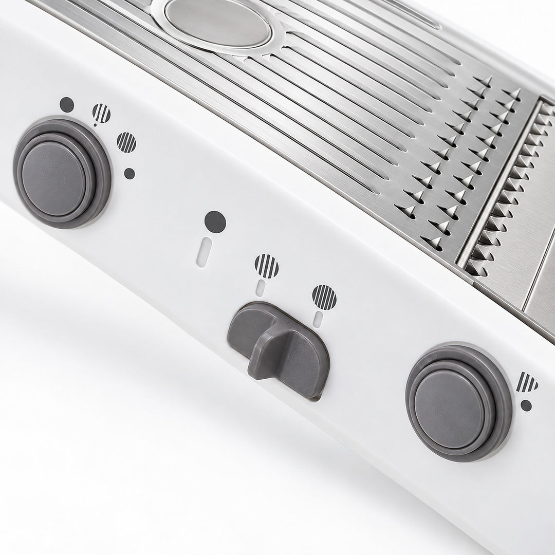 Three side controls for adjusting the mandoline's cutting settings.