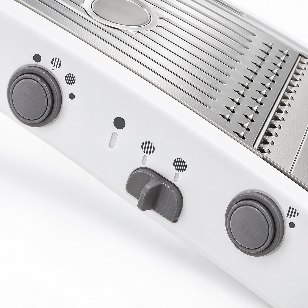 Three side controls for adjusting the mandoline's cutting settings.