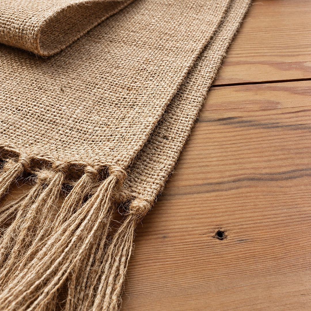 Jute runner knotted fringe and stitched border detail.
