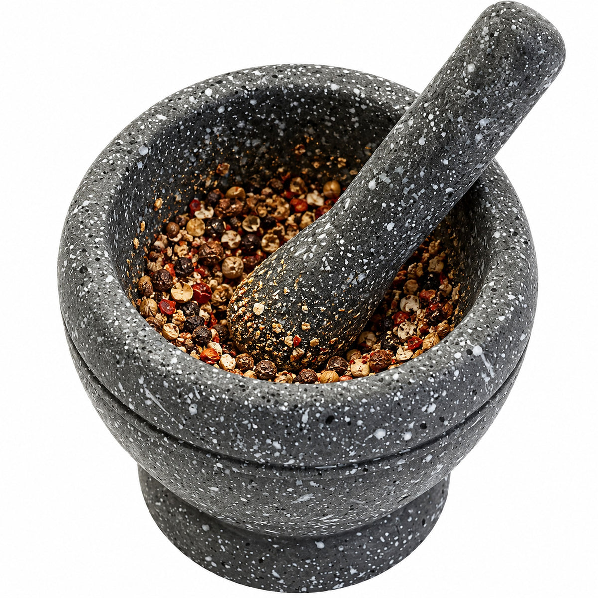 Rounded grinding bowl and matching pestle working against partially crushed spices.