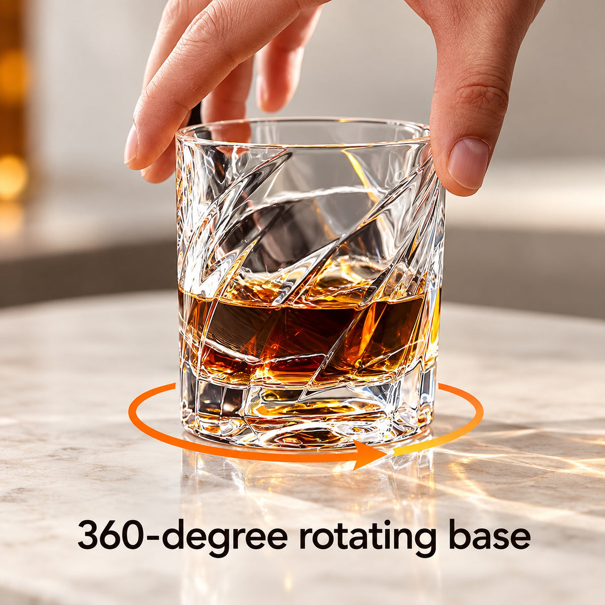 Shark-fin whiskey glass with a base that rotates through 360 degrees with a gentle touch.