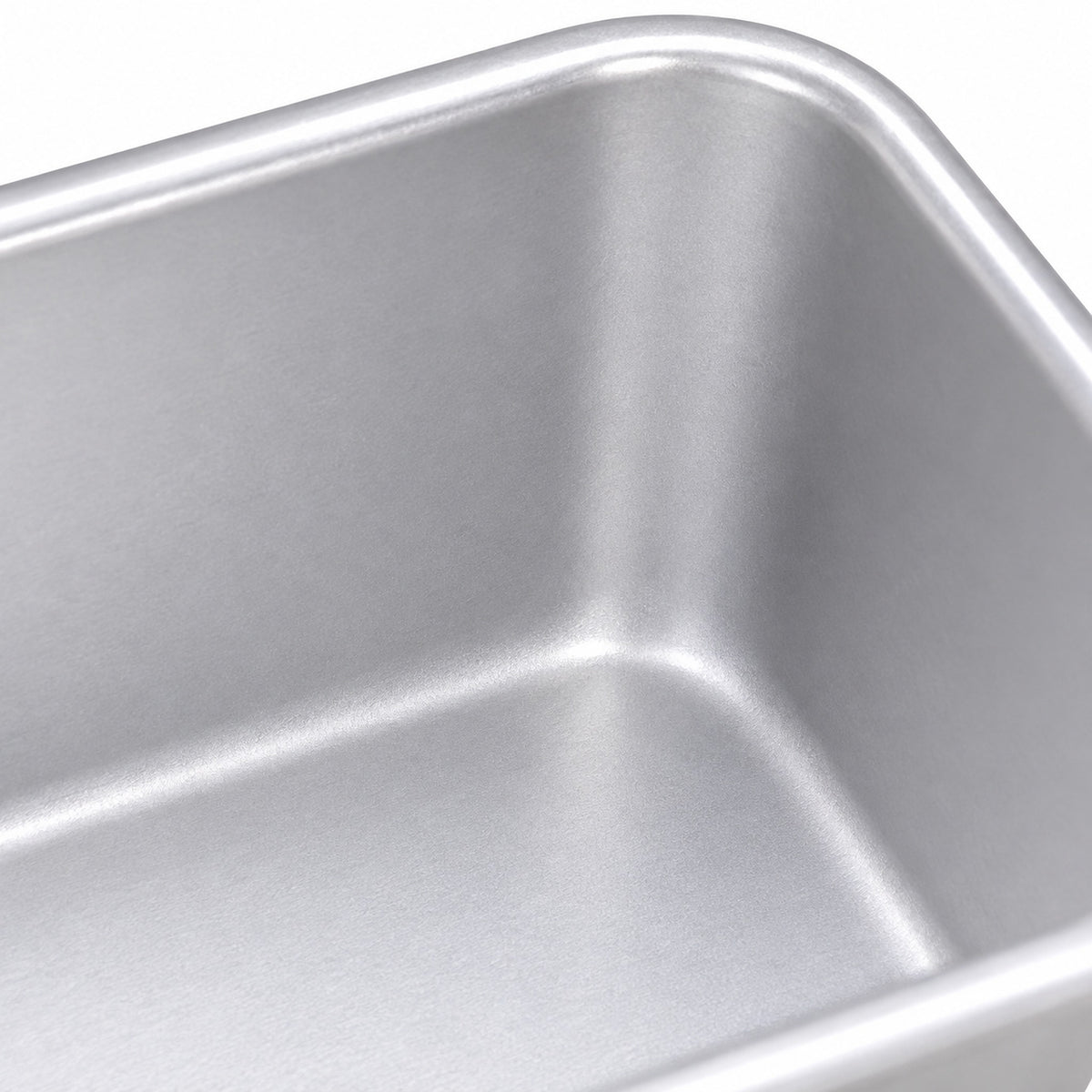 Seamless rounded inner corner of the anodized aluminum loaf pan.