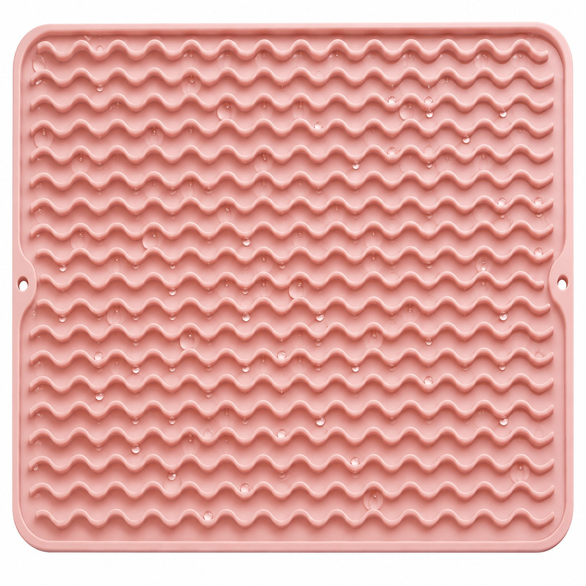 Water droplets on pink silicone mat wavy ridges.