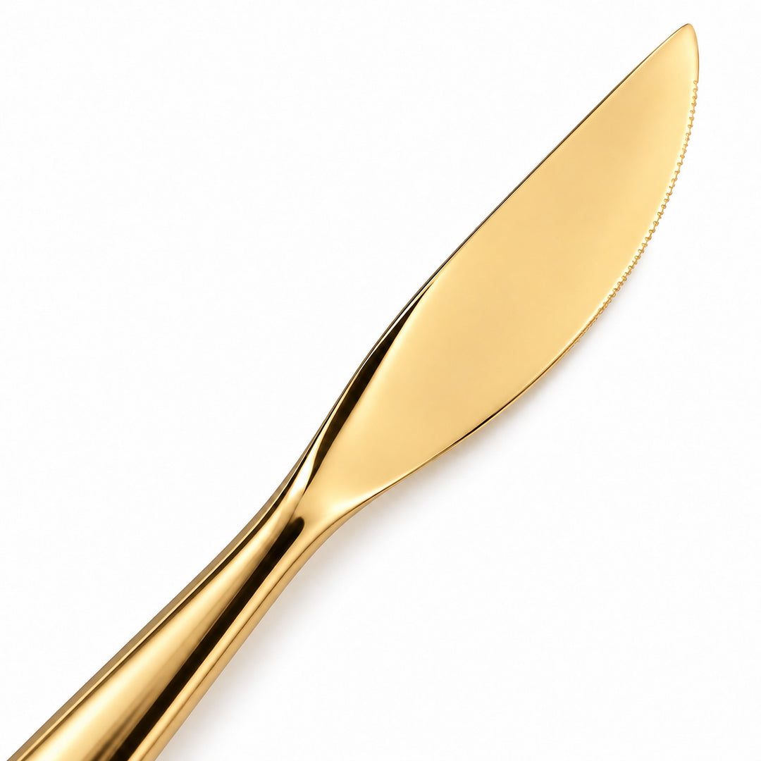 Gold dinner knife curved blade and polished neck detail.