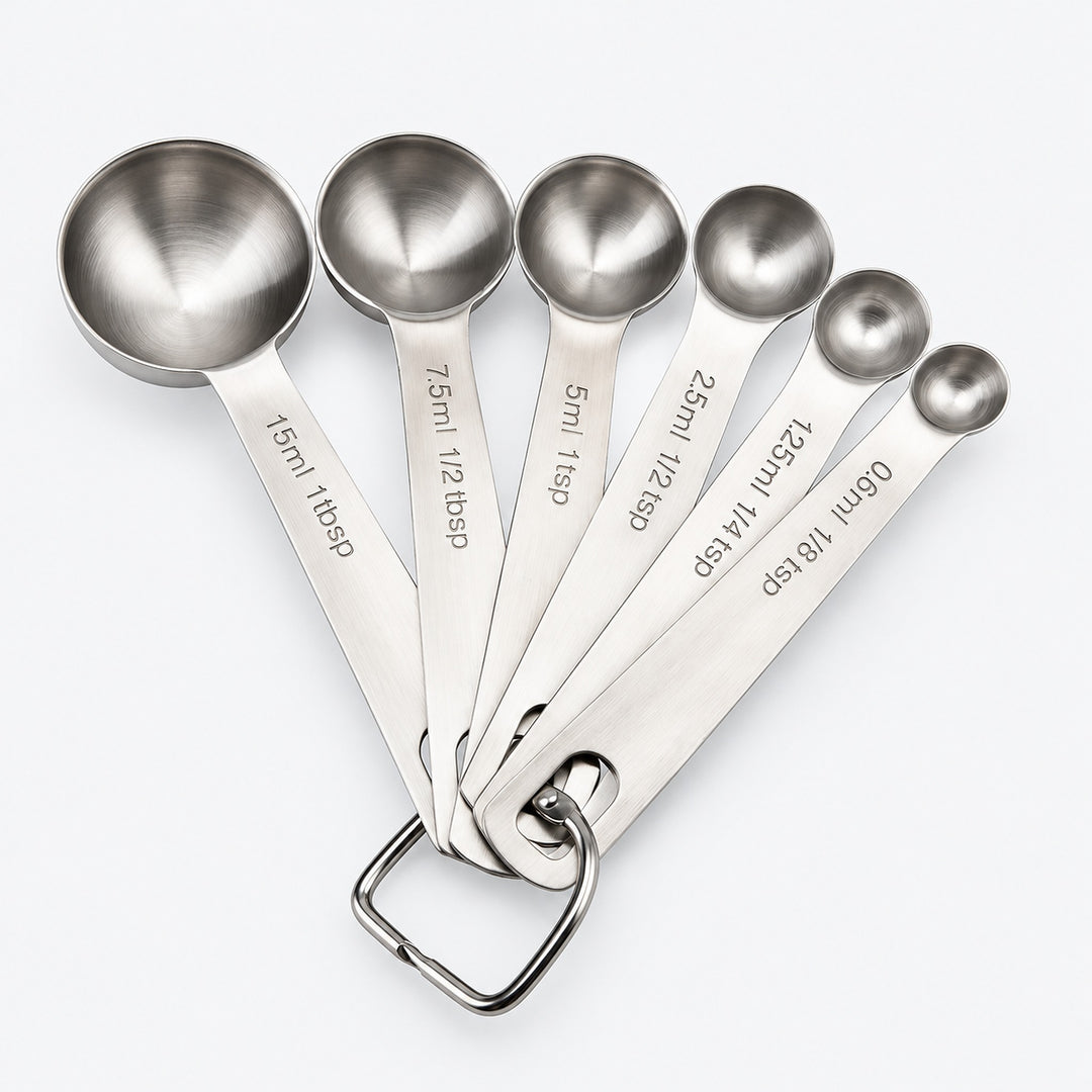 Six stainless-steel measuring spoons from 0.6 to 15 ml, with one connecting ring.