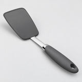 One complete charcoal silicone turner spatula with hanging-hole handle.