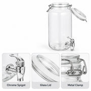 Clear glass beverage dispenser with a chrome spigot, metal clamp lid, and open glass lid, shown on a white background with three detail inset panels labeled Chrome Spigot, Glass Lid, and Metal Clamp.