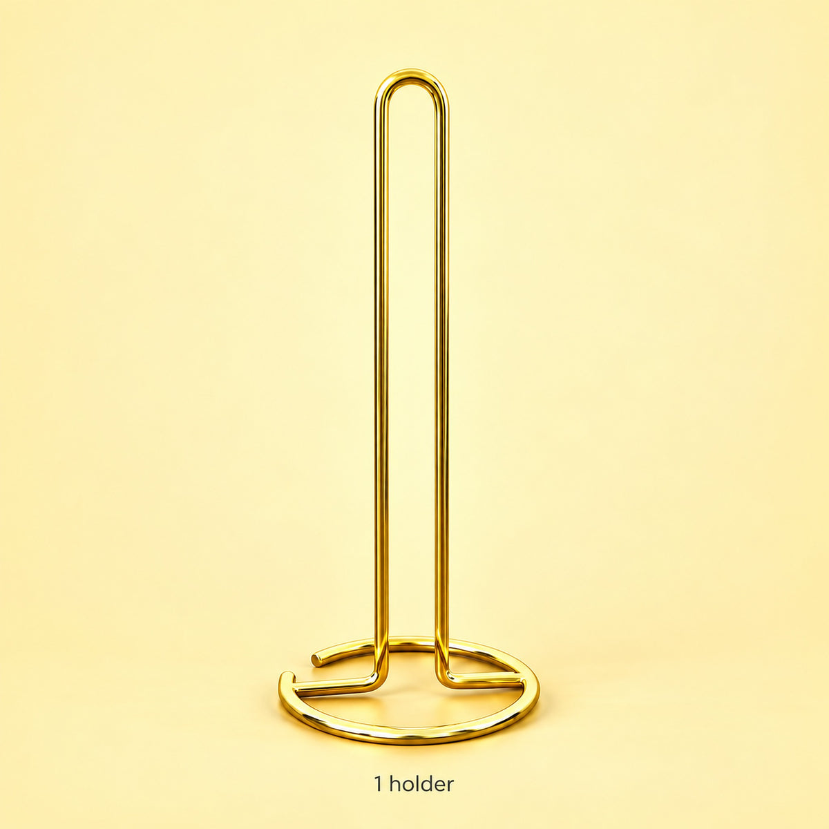 One empty gold paper towel stand; paper roll not included.