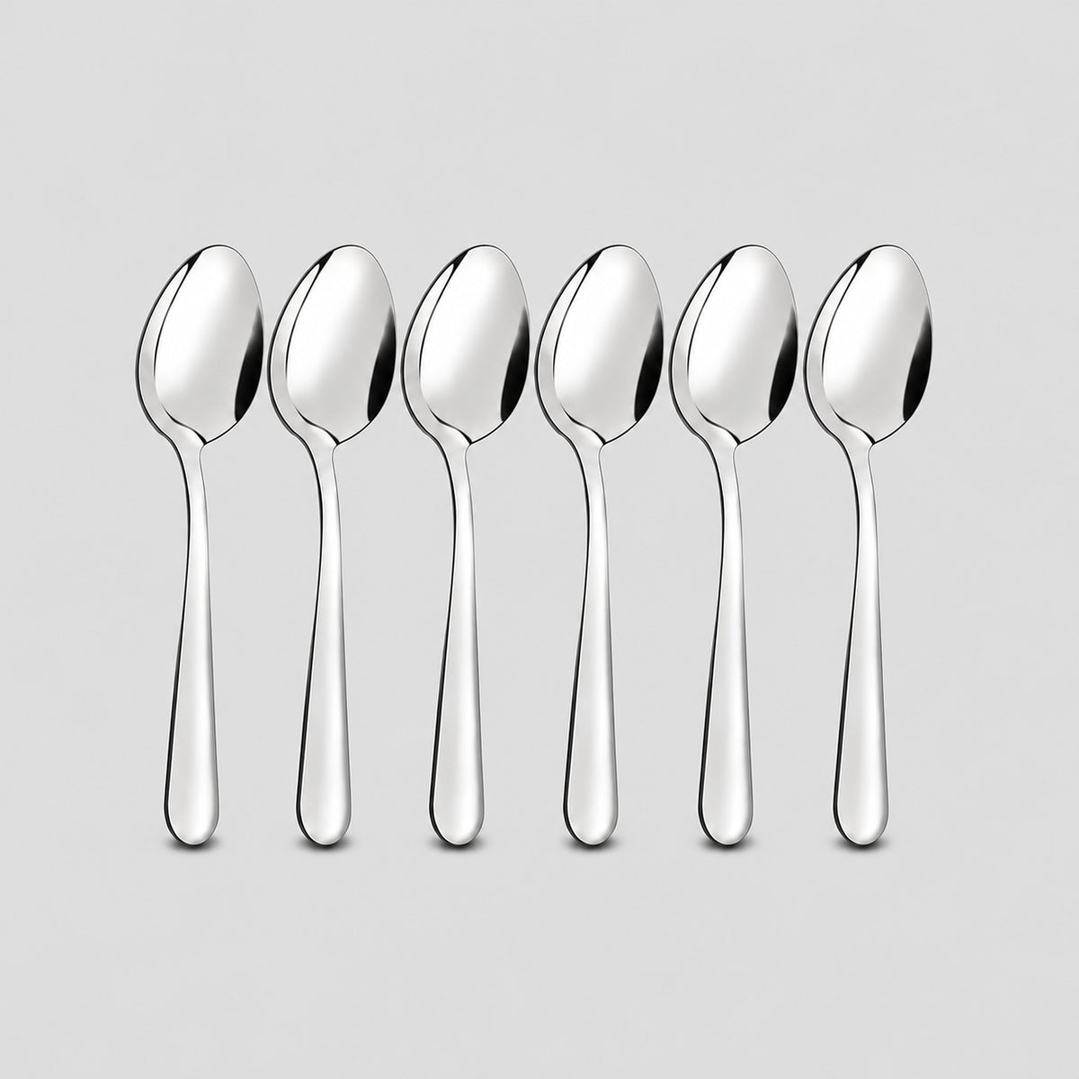 Six-piece set of matching silver stainless steel teaspoons.