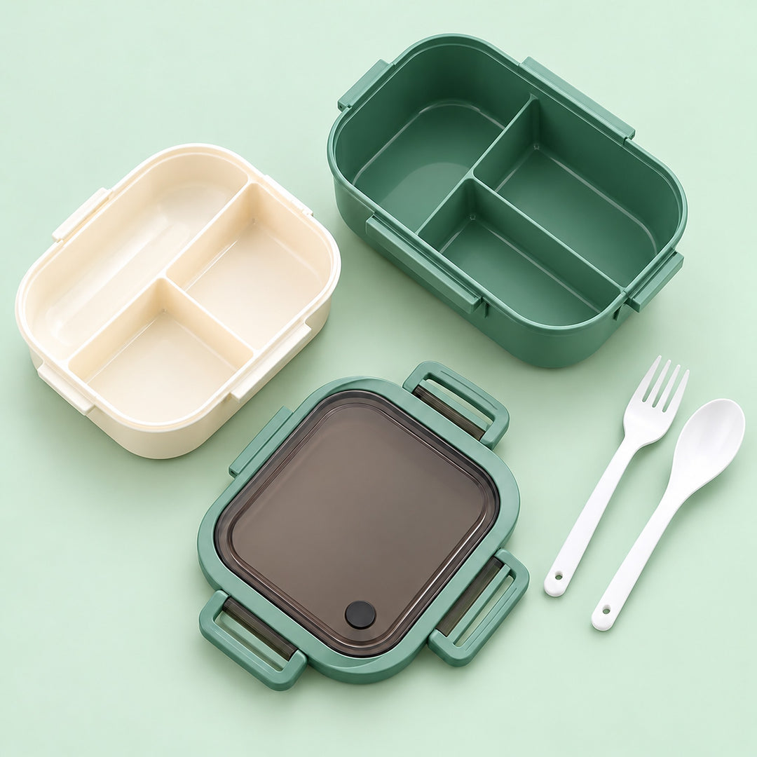 Green lunch box contents: body, upper tray, lid, fork and spoon.