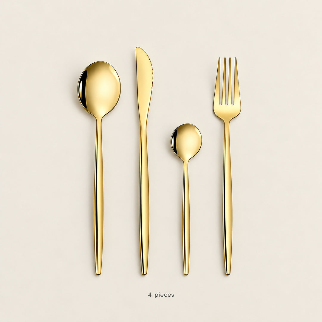 Four-piece Gold setting: one knife, fork, dinner spoon and teaspoon.