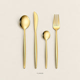 Four-piece Gold setting: one knife, fork, dinner spoon and teaspoon.