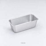 One empty anodized aluminum loaf pan included, without a lid.