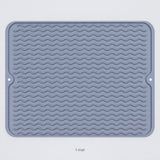 One 40 x 30 cm gray silicone dish drying mat.